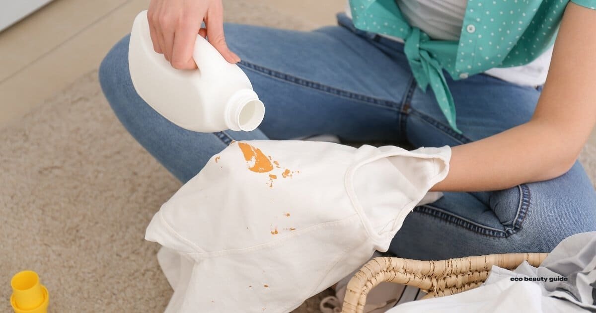 Lady pouring cruelty-free stain remover onto a shirt